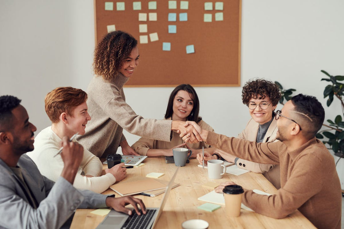 High-performing team celebrating together